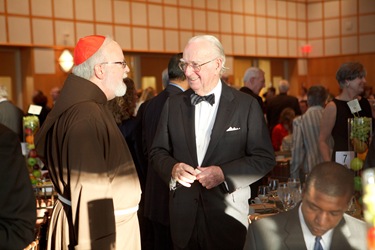 Catholic Charities Annual Spring Gala, held May 20, 2010 at the John F. Kennedy Library in Boston. At the banquet, Ken Hackett, president of Catholic Relief Services, was presented with Charities’ annual Justice and Compassion Award. Pilot photo by Gregory L. Tracy Catholic Charities Annual Spring Gala, held May 20, 2010 at the John F. Kennedy Library in Boston. At the banquet, Ken Hackett, president of Catholic Relief Services, was presented with Charities’ annual Justice and Compassion Award. Pilot photo by Gregory L. Tracy