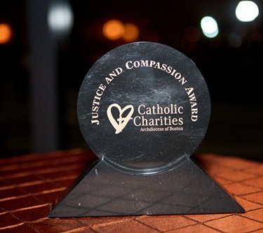 Catholic Charities Annual Spring Gala, held May 20, 2010 at the John F. Kennedy Library in Boston. At the banquet, Ken Hackett, president of Catholic Relief Services, was presented with Charities’ annual Justice and Compassion Award. Pilot photo by Gregory L. Tracy Catholic Charities Annual Spring Gala, held May 20, 2010 at the John F. Kennedy Library in Boston. At the banquet, Ken Hackett, president of Catholic Relief Services, was presented with Charities’ annual Justice and Compassion Award. Pilot photo by Gregory L. Tracy