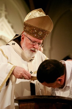 Cardinal Sean P. O'Malley celebrates the Easter Vigil April 23, 2011 at the Cathedral of the Holy Cross. Pilot photo by Jim Lockwood Cardinal Sean P. O'Malley celebrates the Easter Vigil April 23, 2011 at the Cathedral of the Holy Cross. Pilot photo by Jim Lockwood