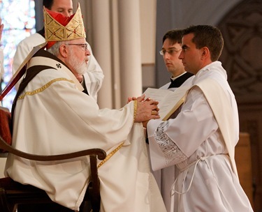 Fathers John D’Arpino, Michael Farrell, Seán Hurley, FPO, Kwang Hyun Lee, Mark Murphy, and Carlos Suarez are ordained to the priesthood by Cardinal Seán P. O’malley May 21, 2011 at the Cathedral of the Holy Cross. 
Pilot photo by Gregory L. Tracy
