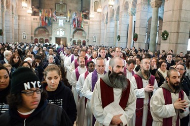 Cardinal Seán P. O'Malley gathers with the various Boston groups taking part in the 2014 March for Life at a morning Mass at the Shrine of the Sacred Heart in Washington, D.C. Jan. 22, 2014.  (Pilot photo by Gregory L. Tracy)