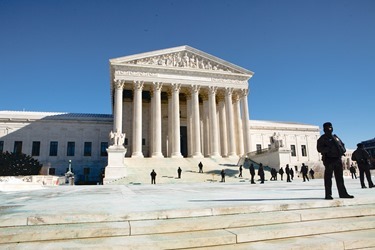 Boston pilgrims stand outside of the Supreme Court during the March for Life Jan. 22, 2014.  (Pilot photo by Gregory L. Tracy)