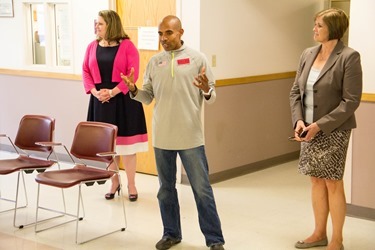 The 2014 Boston Marathon Men’s winner Meb Keflezighi visits Catholic Charities’ Laboure Center in South Boston May 15, 2014. (Pilot photo/ Christopher S. Pineo) 