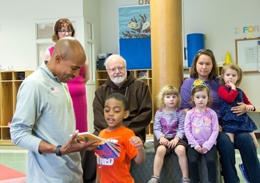 The 2014 Boston Marathon Men’s winner Meb Keflezighi visits Catholic Charities’ Laboure Center in South Boston May 15, 2014. (Pilot photo/ Christopher S. Pineo) 