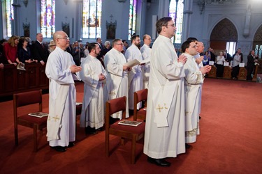 Presbyteral ordination of Fathers Jeffrey Archer, Steven Clemence, Peter DeFazio, George Fitzsimmons, Kevin Hickey, Karlo Hocuscak, Mark Storey, Lawrence Tocci and Jiwon Yoon at the Cathedral of the Holy Cross May 24, 2014. Pilot photo by Gregory L. Tracy