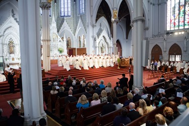 Presbyteral ordination of Fathers Jeffrey Archer, Steven Clemence, Peter DeFazio, George Fitzsimmons, Kevin Hickey, Karlo Hocuscak, Mark Storey, Lawrence Tocci and Jiwon Yoon at the Cathedral of the Holy Cross May 24, 2014. Pilot photo by Gregory L. Tracy