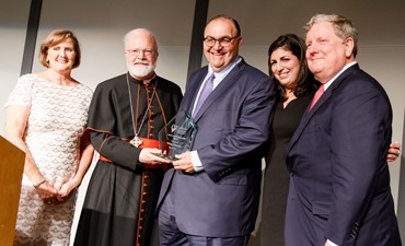 William F. Kennedy receives Catholic Charities’ Justice and Compassion Award May 17, 2017. Pilot photo/ Mark Labbe 